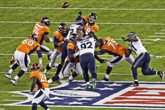 2014-0202-Super-Bowl-XLVIII-Peyton-Manning-Michael-Bennett-op6o-18642.jpg